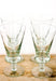 Set of 4 recycled glass wine glasses, made in Swazilsnd with an olive green tint 