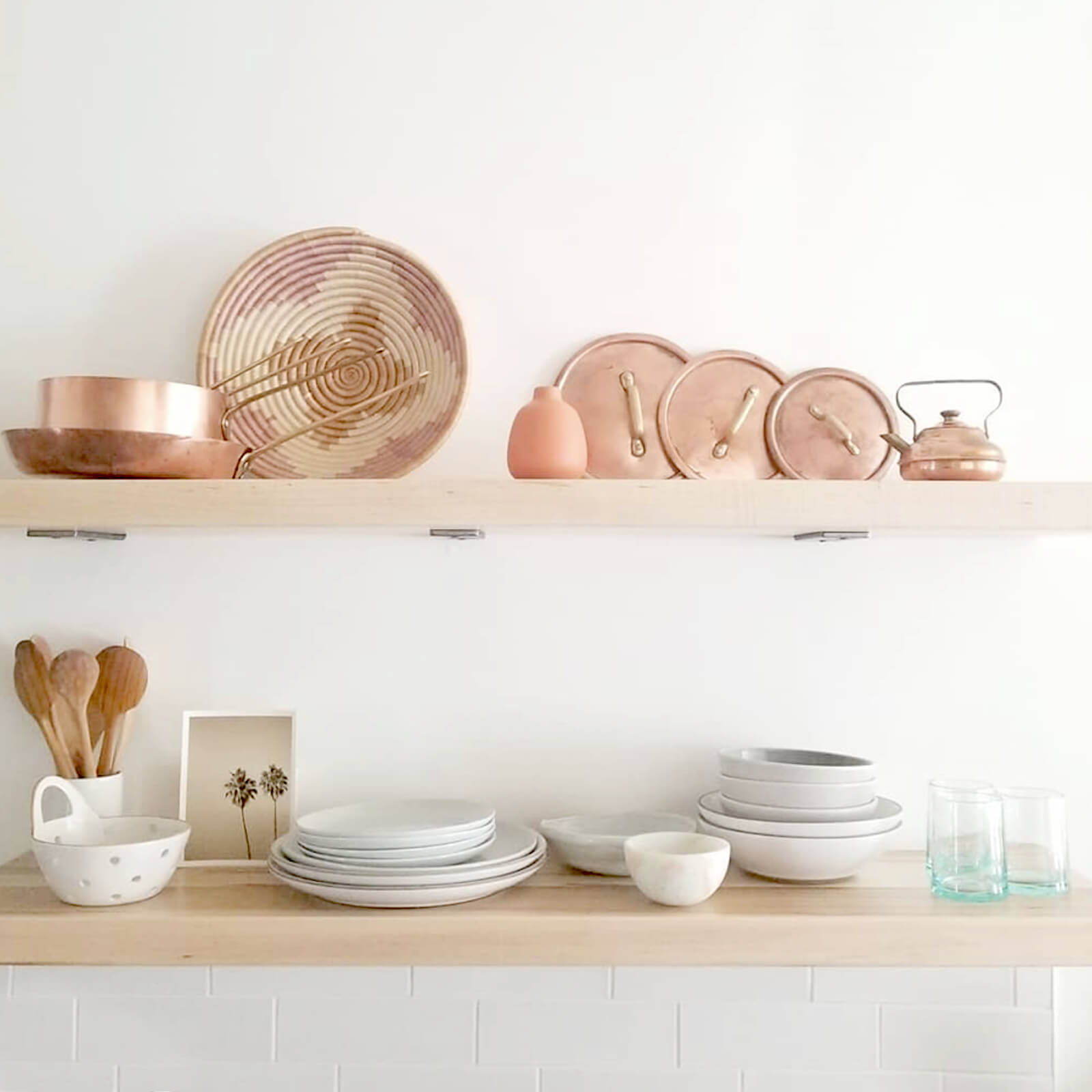 Open kitchen shelves, styled with copper pots and Moroccan recycled glass cocktail glasses 