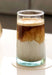 Moroccan recycled glass drinking glass, shown with iced coffee  